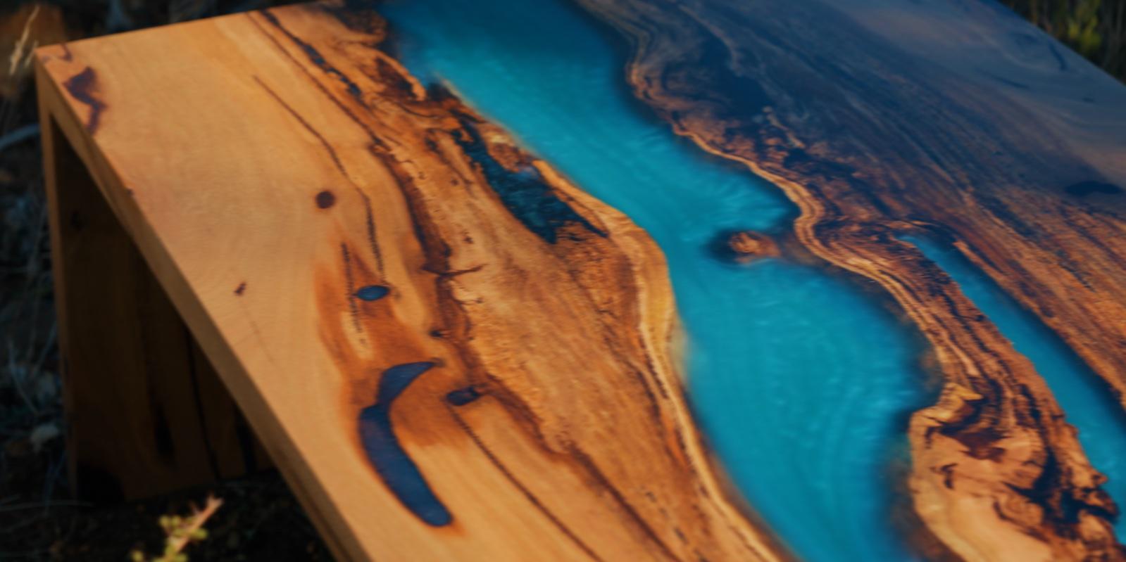 Teal resin river through the Boulder coffee table