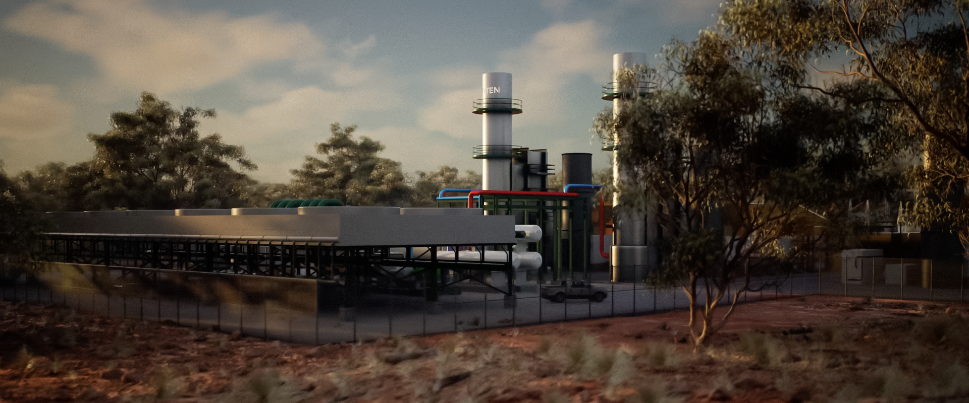 The ATEN power station among the trees, its stacks over the cooling fans