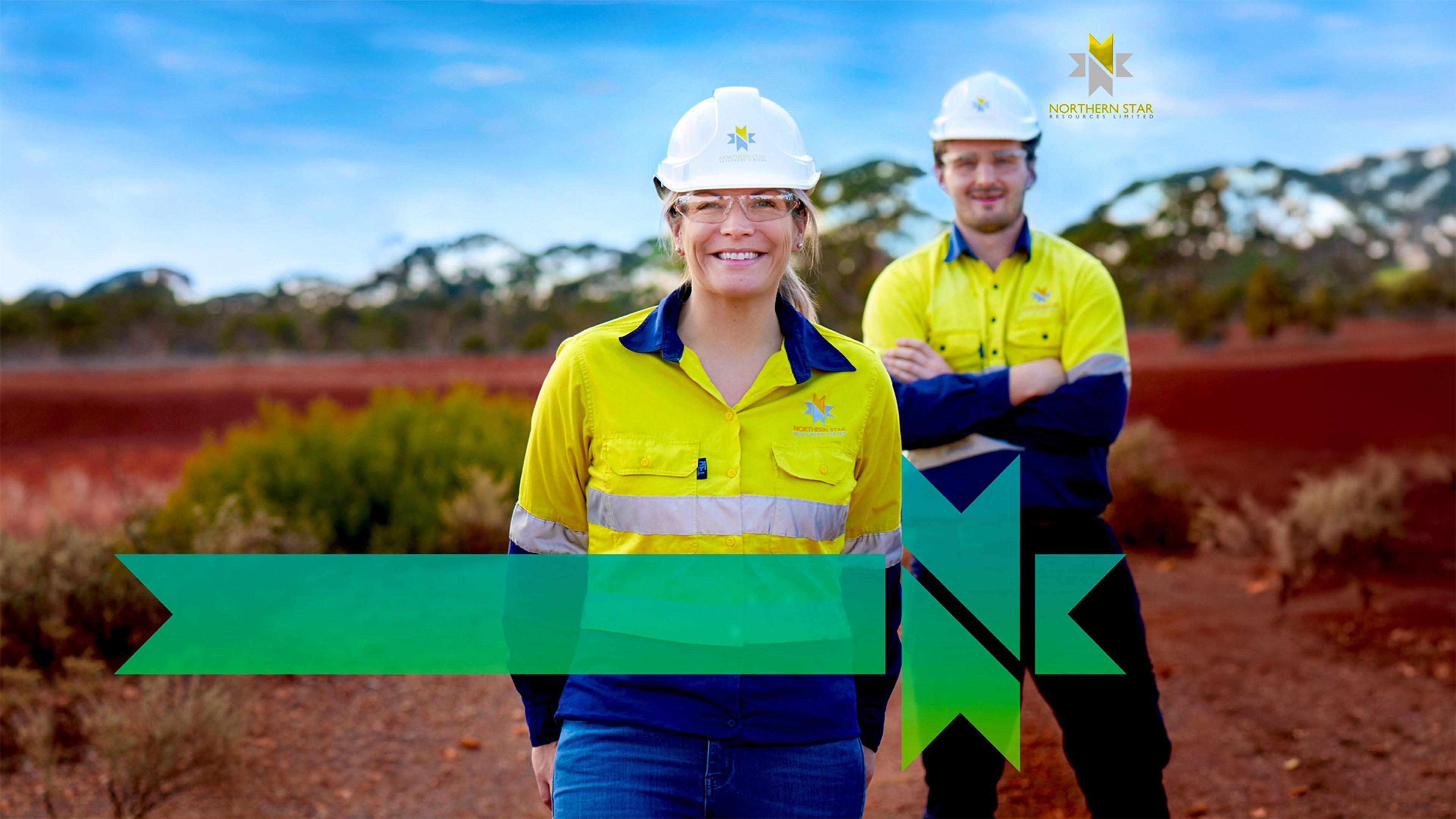 Two Northern Star team members in hi-vis on red earth, from the cover of the 2019 Sustainability Report