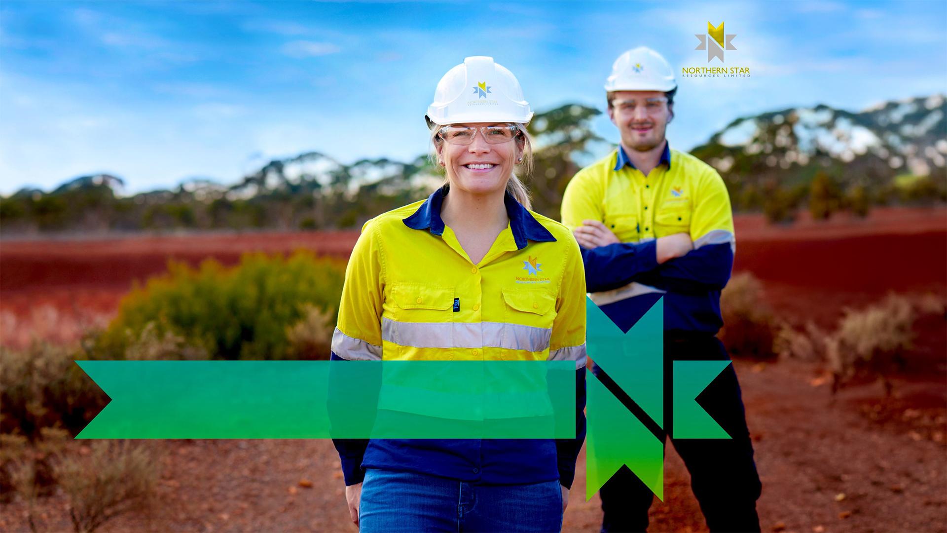Two Northern Star team members in hi-vis on red earth, from the cover of the 2019 Sustainability Report