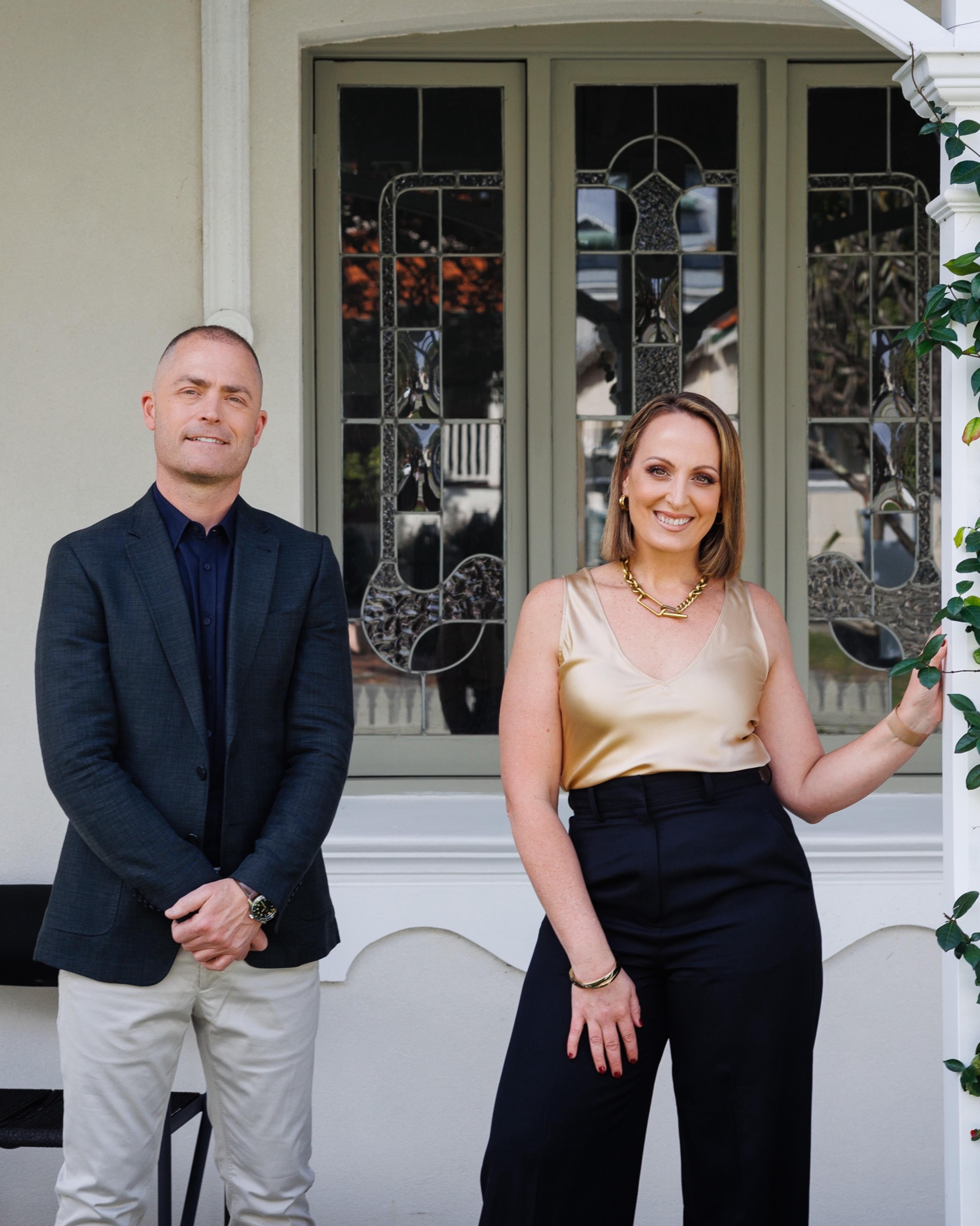 Nadija and Dan, the team behind The Perth Property Co, on a verandah