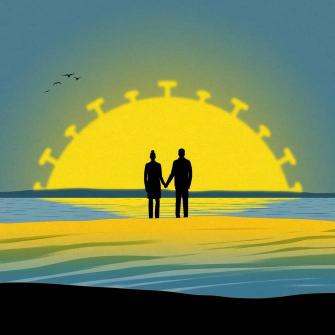 A couple holds hands in front of a sunset that resembles Covid-19 