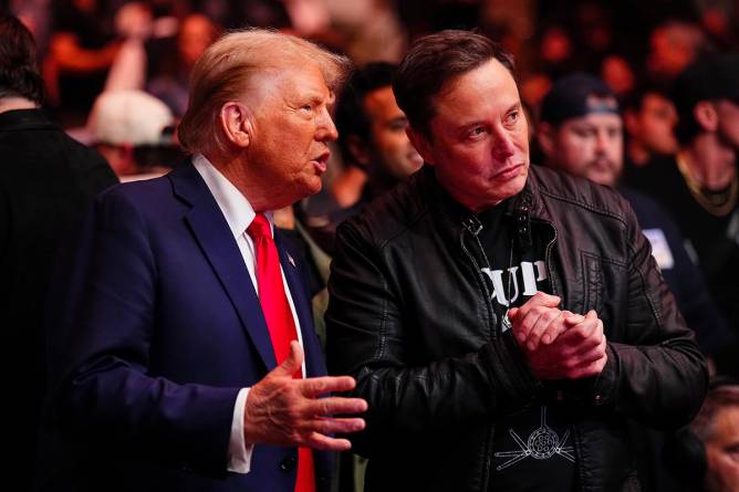 Donald Trump and Elon Musk sitting together