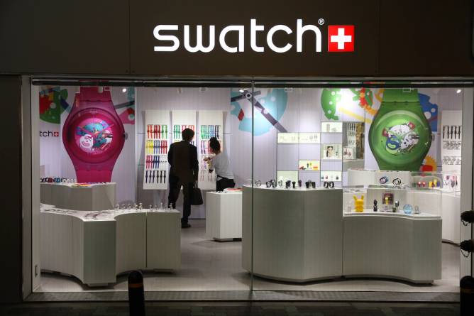 Customers in a Swatch store