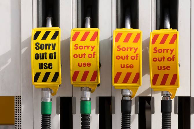 Empty fuel pumps at an Esso petrol station