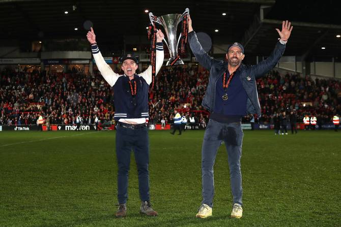 Rob McElhenney and Ryan Reynolds, Owners of Wrexham celebrate with the Vanarama National League trophy 
