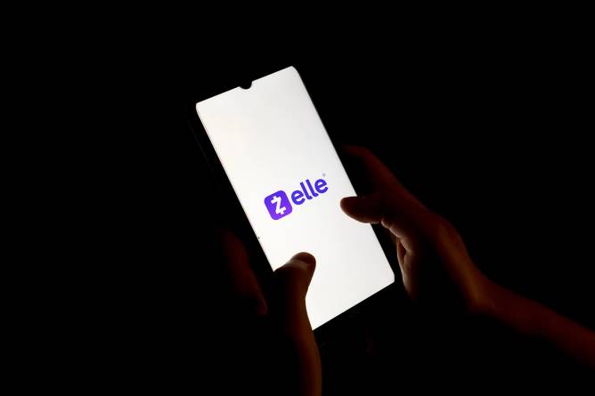 A phone with the Zelle app open