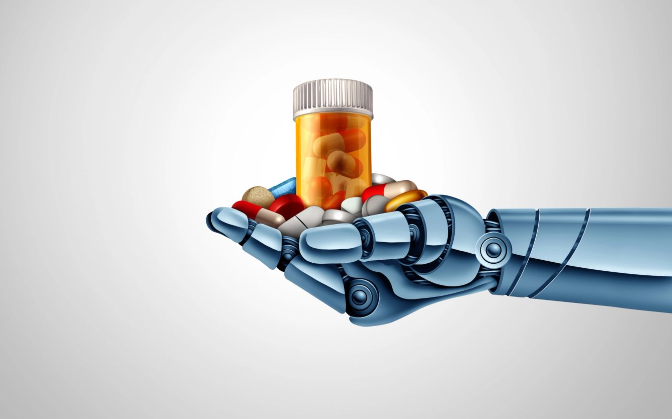 Robot hand holding a pill canister and pills