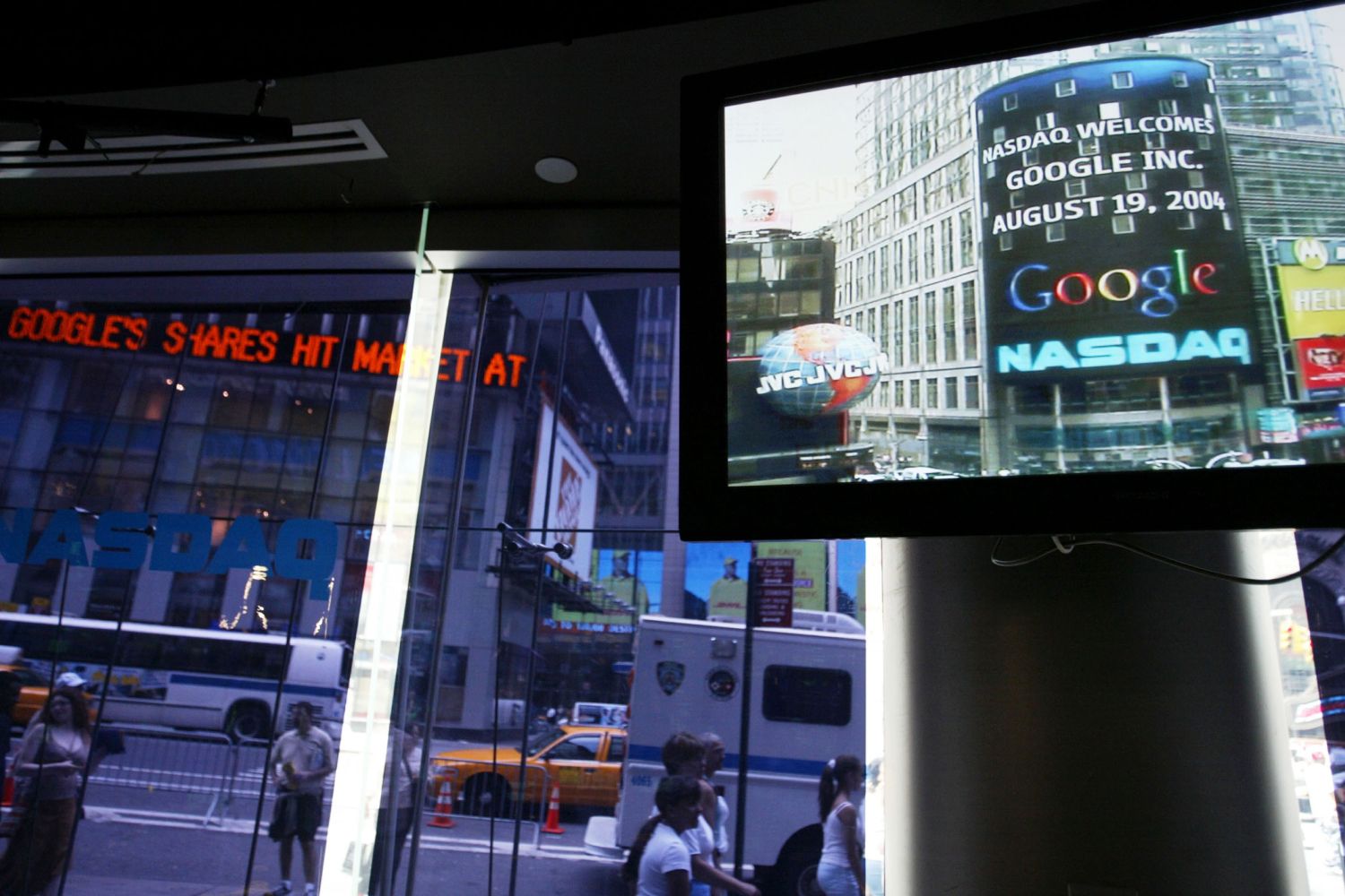 A times square digital billboard that reads Nasdaq welcomes Google Inc. August 19, 2004.