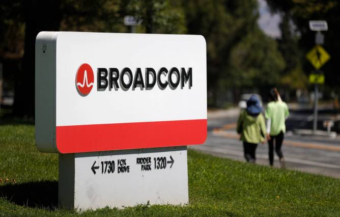 The Broadcom logo on an office park entrance sign.