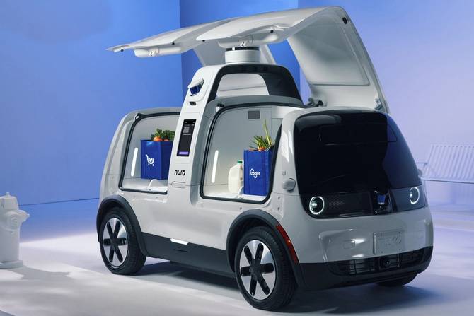 Image of Nuro's self-driving vehicle with groceries inside