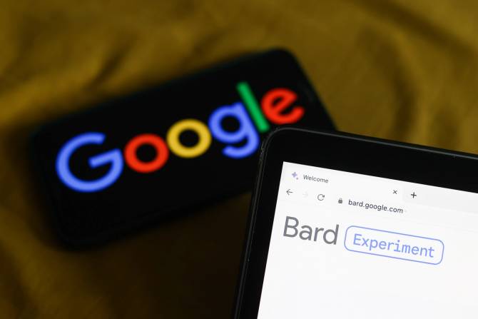 a image of two cell phones one with the Google logo in the background and one with the word Bard in the foreground