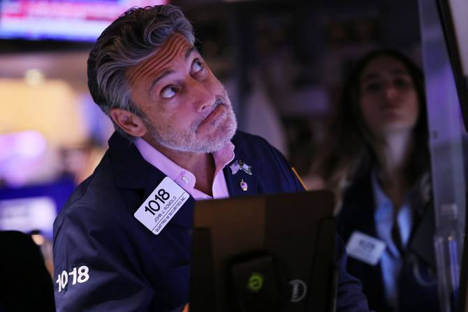 Investor looking anxious at the New York Stock Exchange