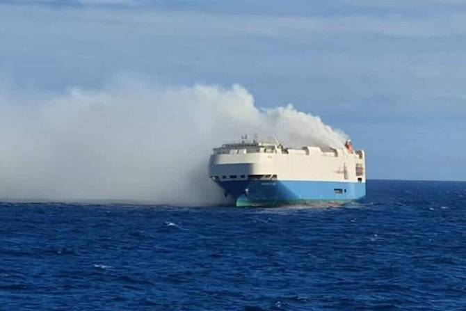 The ship with 4,000 cars on it burning in the ocean