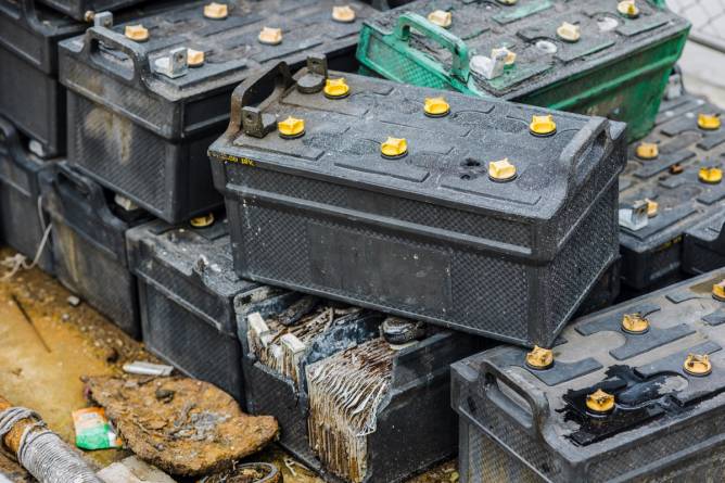 Used EV batteries in a pile.