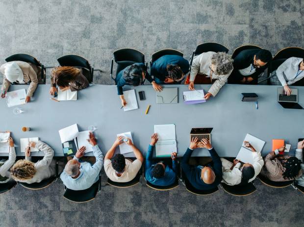an overhead view of a full conference table