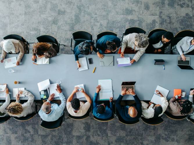 an overhead view of a full conference table
