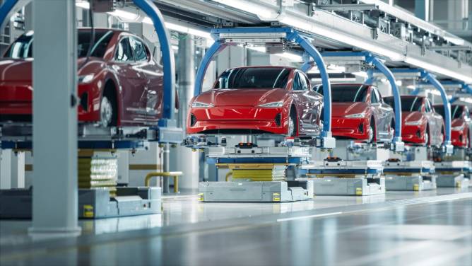 Image of EVs on an assembly line.