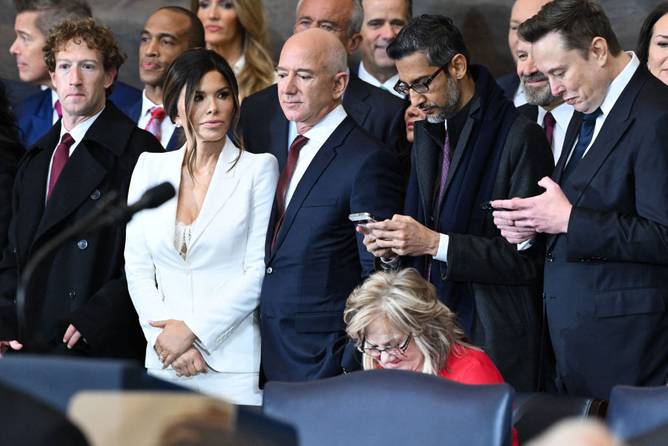 (L-R) CEO of Meta and Facebook Mark Zuckerberg, Lauren Sanchez, Amazon founder Jeff Bezos, Google CEO Sundar Pichai and Tesla and SpaceX CEO Elon Musk attend the inauguration ceremony before Donald Trump is sworn in