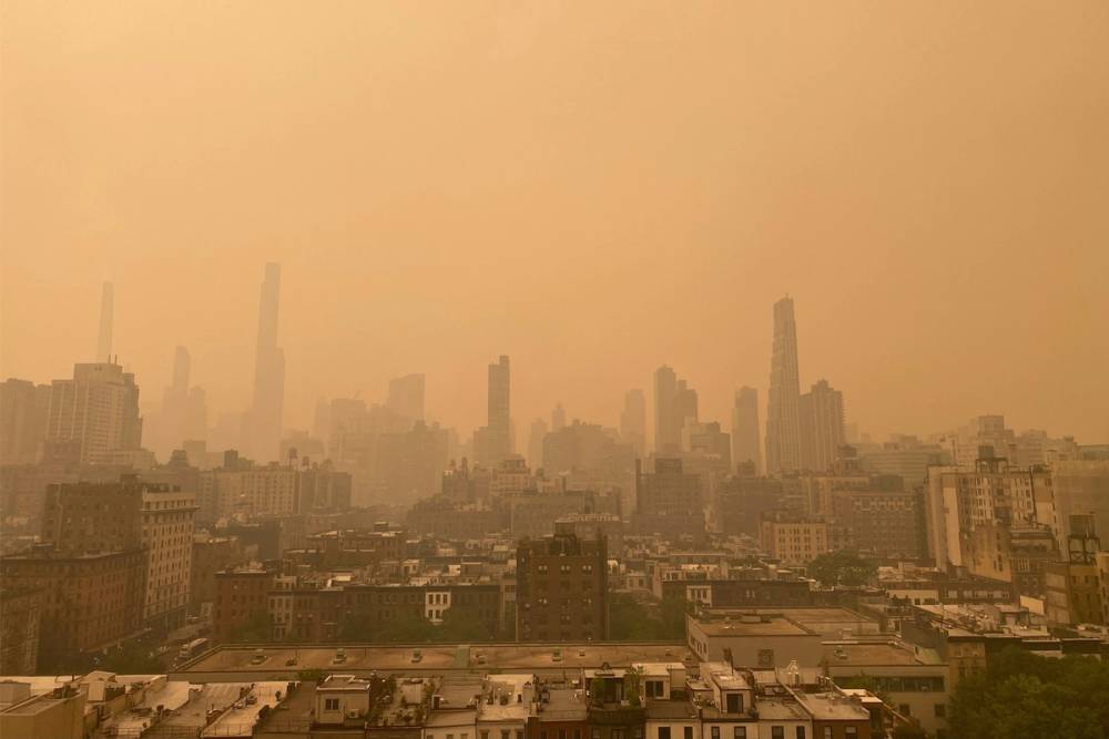 Canada wildfires caused an orange haze of smoke to cover New York City Wednesday.