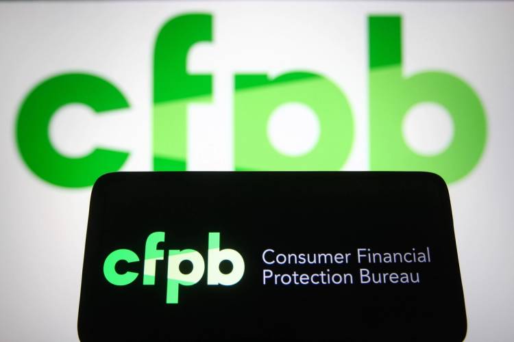 The logo for the Consumer Financial Protection Bureau is pictured on a smartphone. 