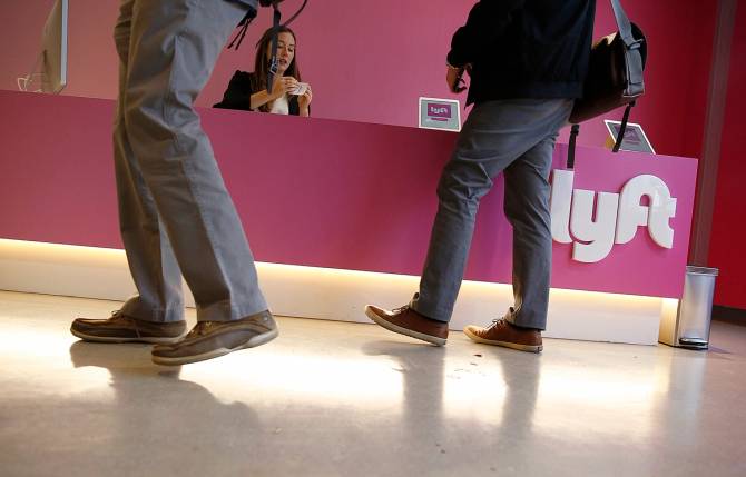 Workers in the Lyft lobby