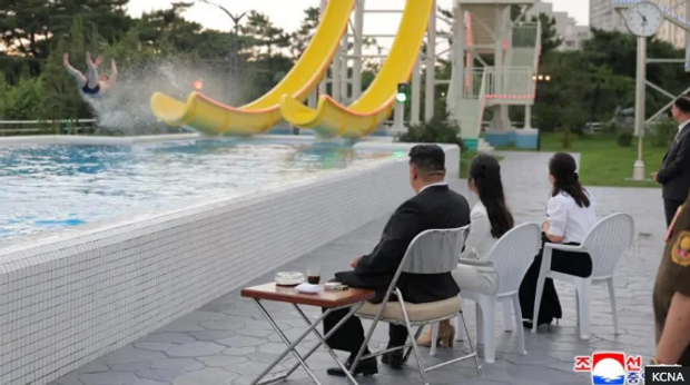 Kim Jong Un, his daughter Kim Ju Ae and his wife Ri Sol Ju at a waterpark in the Wonsan Kalma