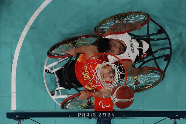  Ignacio Ortega of Team Spain shoots against Jorge Salazar of Team United States during the Men's Wheelchair Basketball Preliminary Round Group B Game 3 match between Team United States and Team Spain