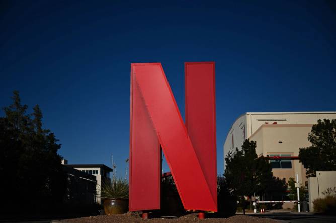 a large red N from the Netflix logo outside of an office building 