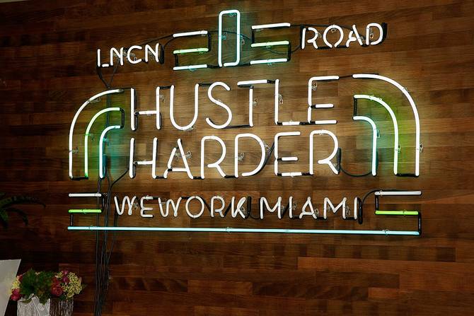 A sign on a WeWork office in Miami