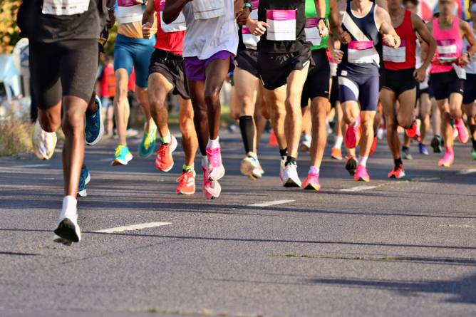 Marathon runners on street