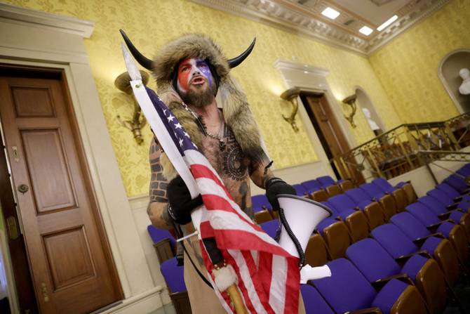 The QAnon Shaman in the Capitol building