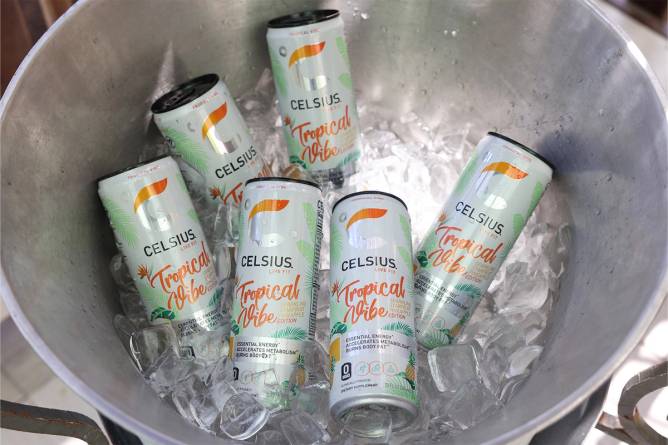 A bucket of Celsius Tropical Rush cans