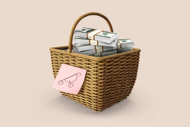A woven basket filled with stacks of $100 bills and a sticky note with a baby stroller icon.