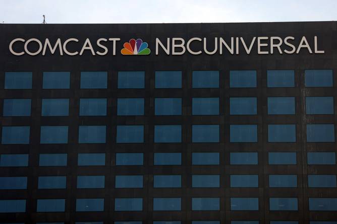 Comcast NBCUniversal logo on building.