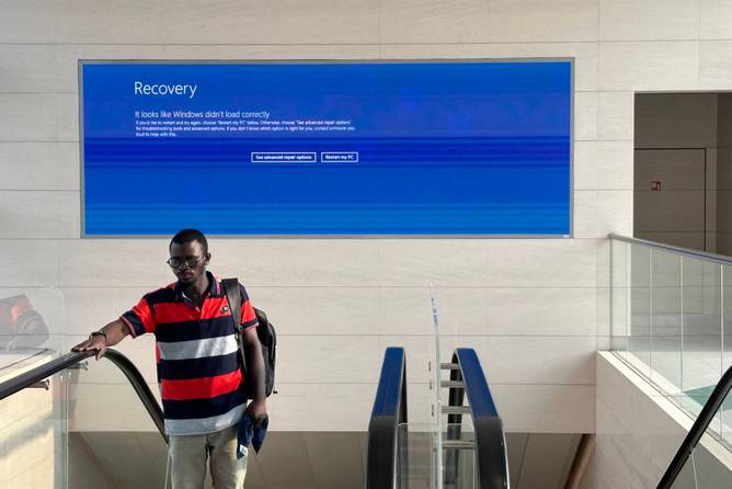 A large screen in the Dubai Metro is out of function on July 19, 2024, amid a massive global IT outage. Airlines, banks, TV channels and other business across the globe were scrambling to deal with one of the biggest IT crashes in recent years on July 19, 2024