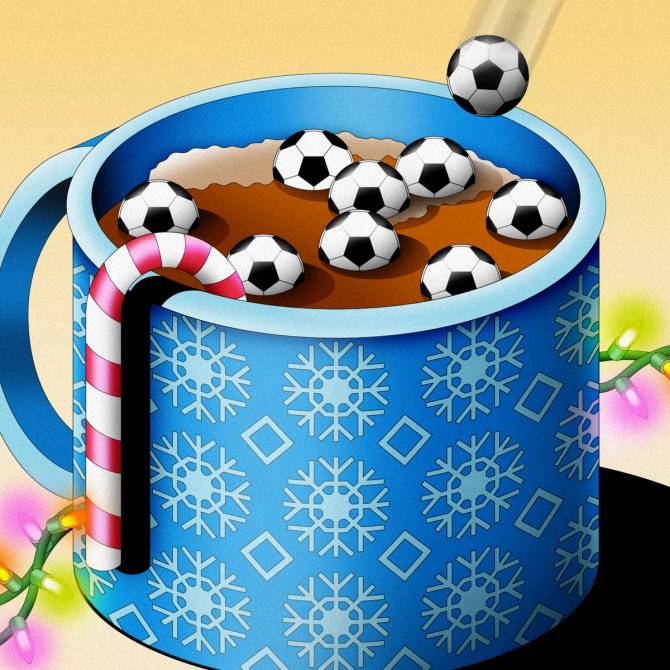 Winter mug with soccer balls in it