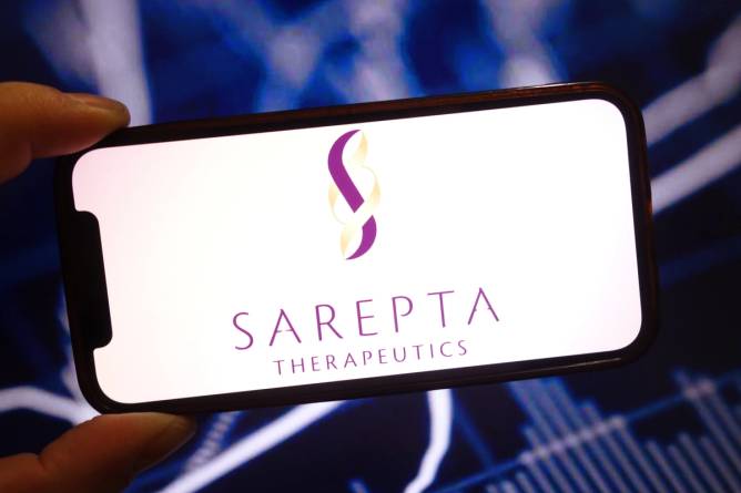 the Sarepta Therapeutics company logo is seen displayed on a smartphone screen.