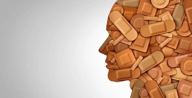 an outline of a human head cover band aids