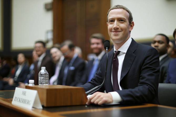 Facebook co-founder and CEO Mark Zuckerberg testifies before the House Financial Services Committee in the Rayburn House Office Building on Capitol Hill