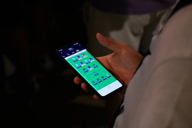 A person using a sports betting app