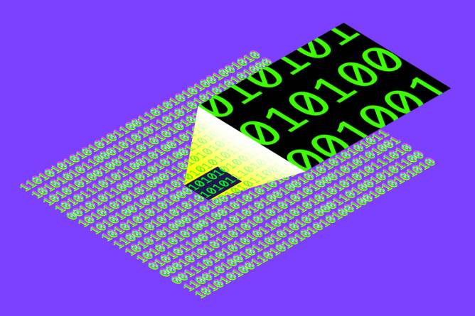 Binary code being enlarged by a digital magnifying display.