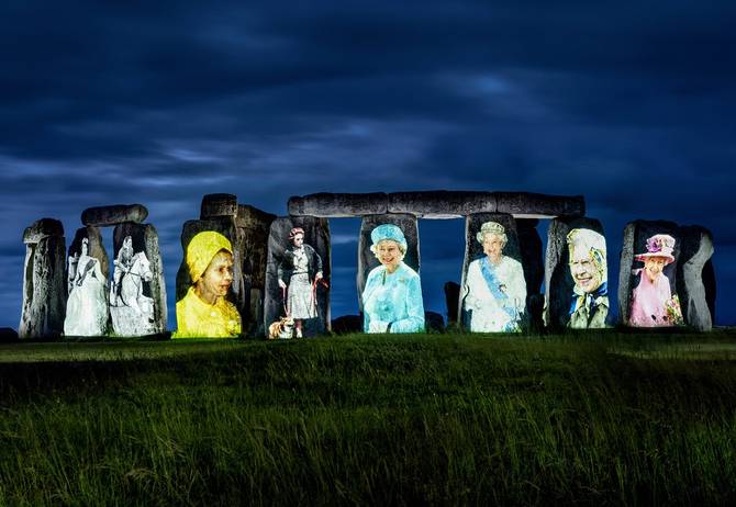 Stonehenge showing pictures of Queen Elizabeth II