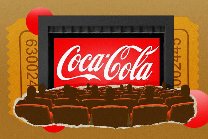 the Coca-Cola logo on a movie theater screen