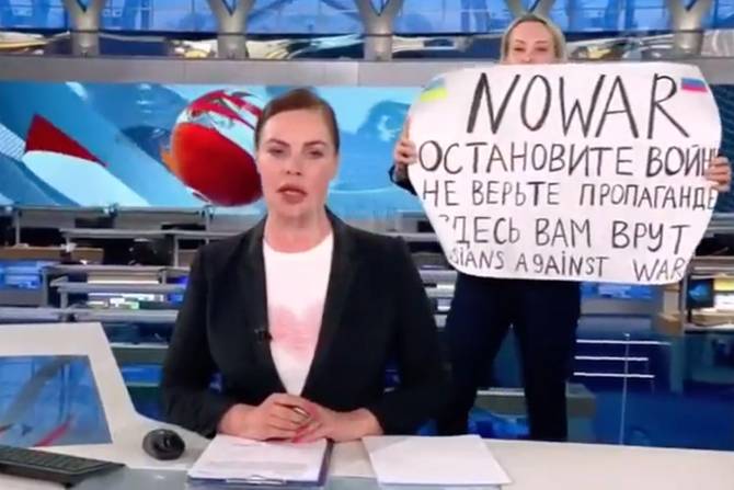 A woman protesting the war on live TV
