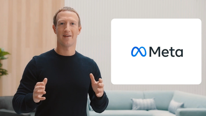 Mark Zuckerberg standing in front of a poster that says "Meta"
