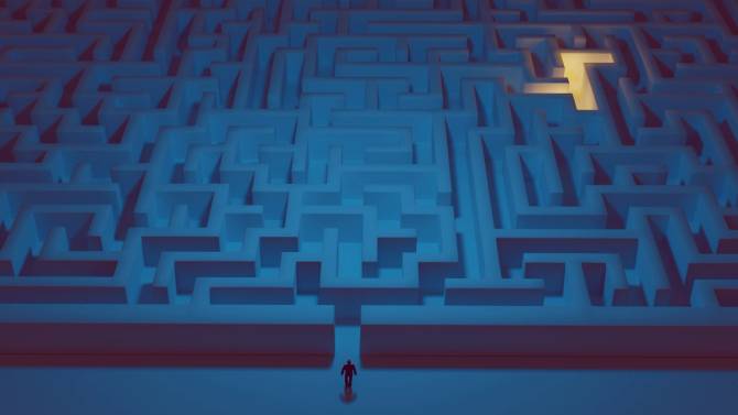 abstract man standing at the beginning of a large complicated blue maze