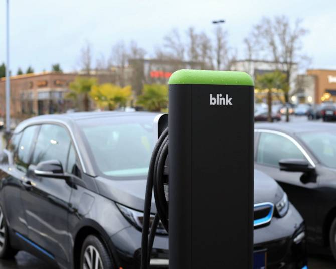 closeup of a blink charger in a parking lot