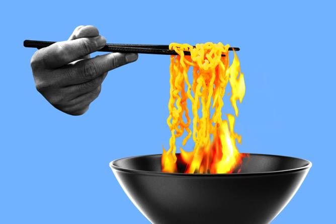 A bowl of ramen that's on fire