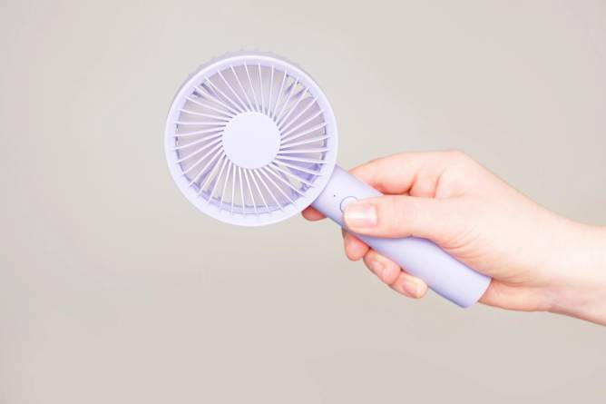 Powered hand fan